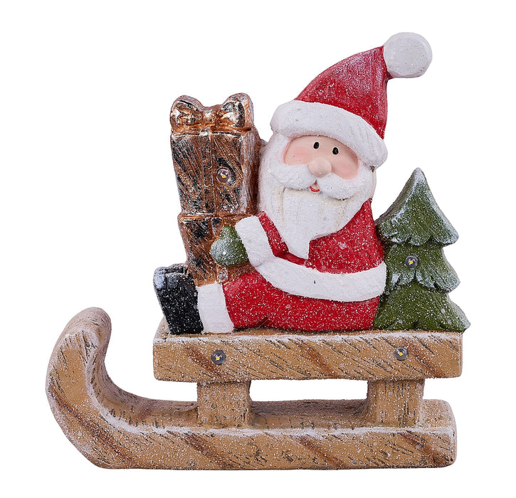 11.75"H X 11.75"L Santa On Sled W/Gift Lt Brown/Red/White/Grn XN3754
