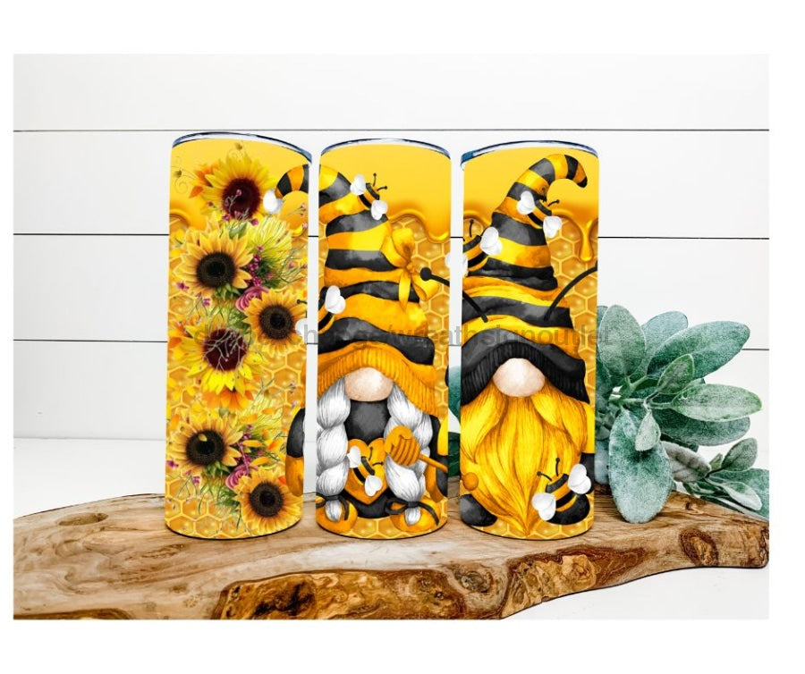 https://www.decoexchange.com/cdn/shop/files/bee-gnomes-tumbler-sunflower-and-20-oz-skinny-decoetumbler-227-224_1024x1024.jpg?v=1688726253