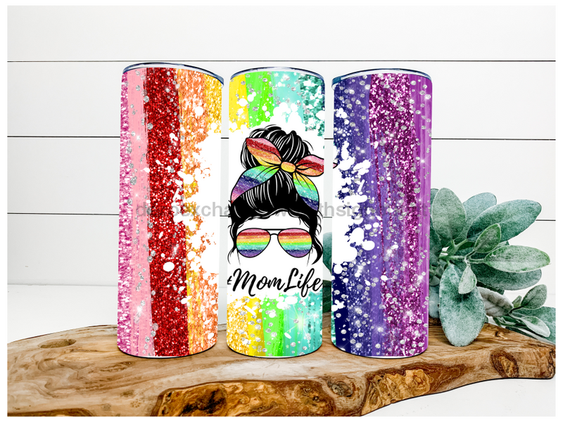 https://www.decoexchange.com/cdn/shop/files/rainbow-pride-mom-life-glitter-tumbler-20-oz-skinny-decoetumbler-145-943_1200x600_crop_center.png?v=1688710309