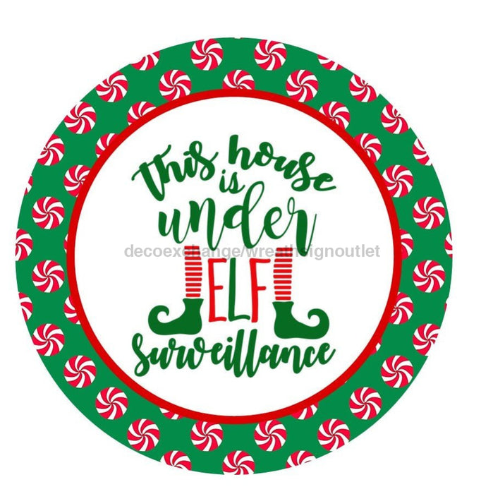 VINYL DECAL | THIS HOUSE IS UNDER ELF SURVEILLANCE | ELF | WINTER | CHRISTMAS - Unique in the Creek LTD